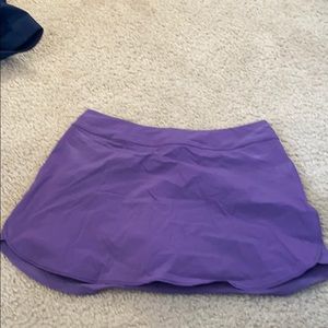 Purple outdoor voices tennis skit size small.